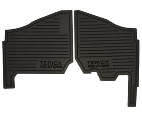 Two black rubber floor mats with 'Terick Solutions' branding on a beige background